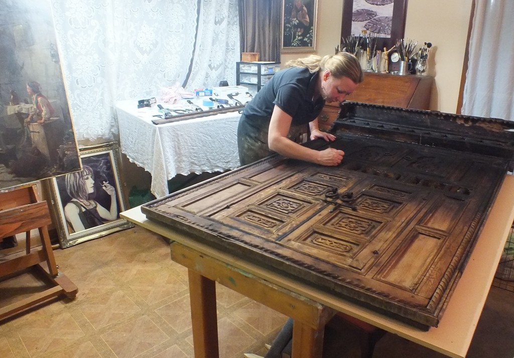 Kate beginning restoration on a 200 year old Moroccan door.