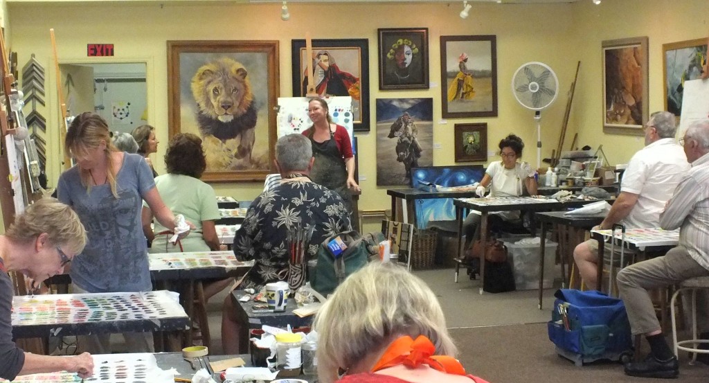 Kate Wood teaching color mixing in one of her art classes.